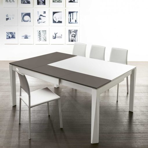 Hanno Giesler designed Plurimo, a rectangular convertible two-tone table extendable in both width and depth. Patented and made in Italy. Free home delivery.