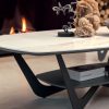 Ceramic top in Calacatta Gold finish and metal base. This modern coffee table also has an additional shelf. Its legs are graphite painted. Online shopping.