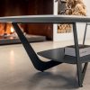 Ceramic top in Calacatta Gold finish and metal base. This modern coffee table also has an additional shelf. Its legs are graphite painted. Online shopping.