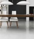 Pulse is an extendable wood dining table designed by Arter & Citton. The graceful curves and designs of this modern dining table are created to add elegance to any room.