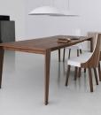Pulse is an extendable wood dining table designed by Arter & Citton. The graceful curves and designs of this modern dining table are created to add elegance to any room.