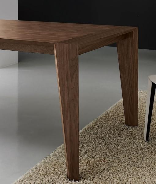 Pulse is an extendable wood dining table designed by Arter & Citton. The graceful curves and designs of this modern dining table are created to add elegance to any room.