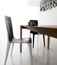 Pulse is an extendable wood dining table designed by Arter & Citton. The graceful curves and designs of this modern dining table are created to add elegance to any room.