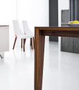 Pulse is an extendable wood dining table designed by Arter & Citton. The graceful curves and designs of this modern dining table are created to add elegance to any room.