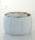 Furniture complement for additional accommodation. Round pouf available in several colours and coverings of leather or fire resistant eco-leather.