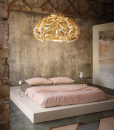 Original and luxurious round gold suspension handmade in Italy with recyclable technopolymers. Stunning three-dimensional effect. Free home delivery.