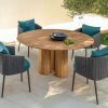 Shop online for a beautiful and luxurious round outdoor dining table in Accoya wood. High-quality outdoor furniture in free home delivery. Made in Italy.