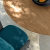Shop online for a beautiful and luxurious round outdoor dining table in Accoya wood. High-quality outdoor furniture in free home delivery. Made in Italy.