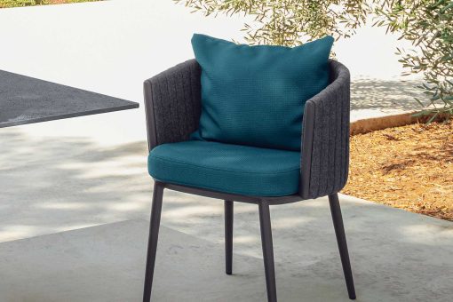 Shop online for high quality outdoor furniture. This luxurious blue dining chair has padded seat and backrest. Free home shipping.