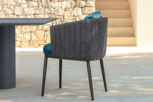 Shop online for high quality outdoor furniture. This luxurious blue dining chair has padded seat and backrest. Free home shipping.