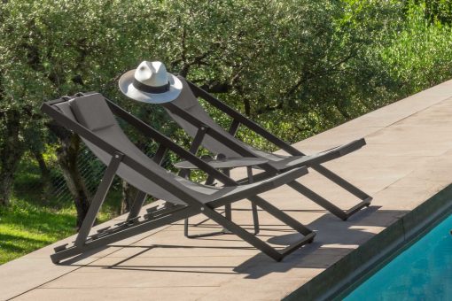 High-quality grey deck chair. Solid folding aluminium structure and comfortable Textilene seat. Elegant outdoor furniture. Worldwide home delivery.