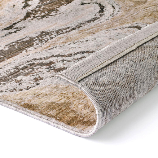 Close-up of the wave motif and polyester pile of Elixir 530/RD9 E Light Grey Sand rug