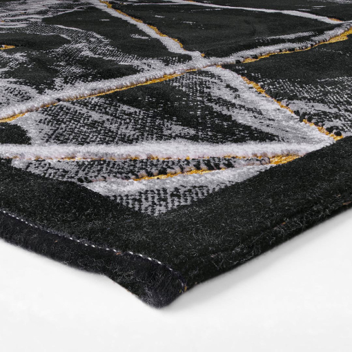 Close-up of marble-effect texture in black and light tones