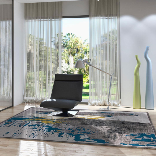 Blue and gold rug styled in elegant contemporary living room