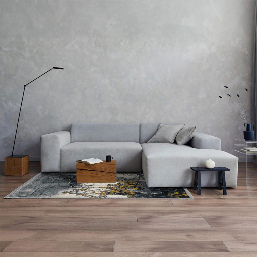 Black and gold rug styled in luxury living room