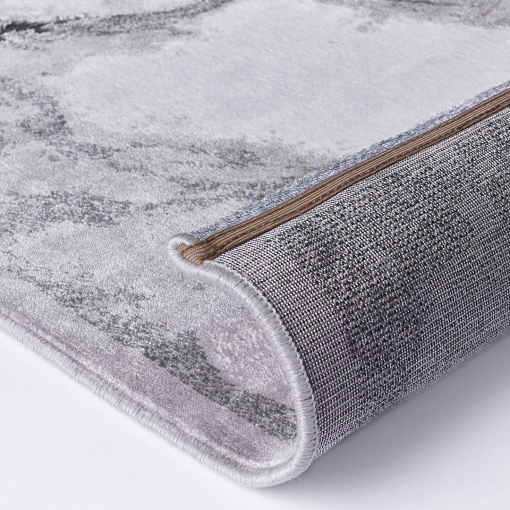 Close-up of marble-effect texture in grey tones