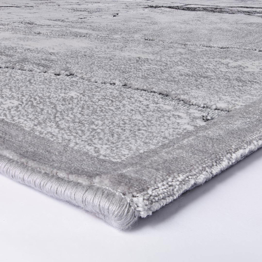 Close-up of marble-effect texture in grey tones
