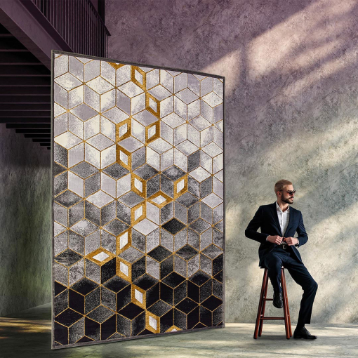 Rectangular rug in grey and gold with 3D cube geometric design
