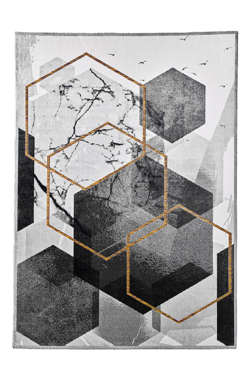 Rectangular rug in grey and gold with stylised hexagonal pattern