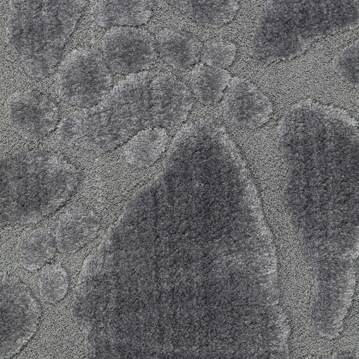 Gros plan de la texture 3D effet pierre du tapis Venere Stone Grigio Perla
