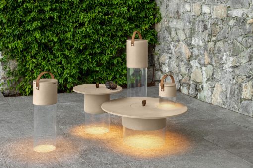 Round outdoor coffee table with dimmable LED battery supplied lamp. Design Studio Adolini. Several sizes. Sand or graphite colour. Free home delivery.