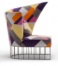 A curved shape luxurious armchair with patterned fabric and chrome steel base. A very suggestive high-quality piece of furniture. Free delivery.