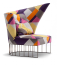 A curved shape luxurious armchair with patterned fabric and chrome steel base. A very suggestive high-quality piece of furniture. Free delivery.