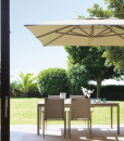 Big decentralized parasol in aluminium. 3x4 meters, sliding guides, 3 colours available (white, dove and grey). Online sale for the best outdoor furniture.