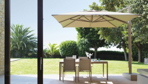 Big decentralized parasol in aluminium. 3x4 meters, sliding guides, 3 colours available (white, dove and grey). Online sale for the best outdoor furniture.