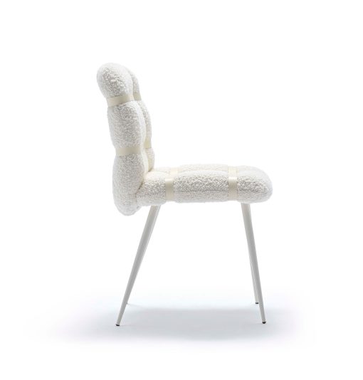 Archirivolto's padded dining chair with 4 legs, fabric upholstery and leather weaving. Made in Italy trendy character. Free home delivery.