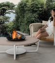 Round outdoor coffee table with central brasier. Design outdoor garden coffee table. aluminium and marble.