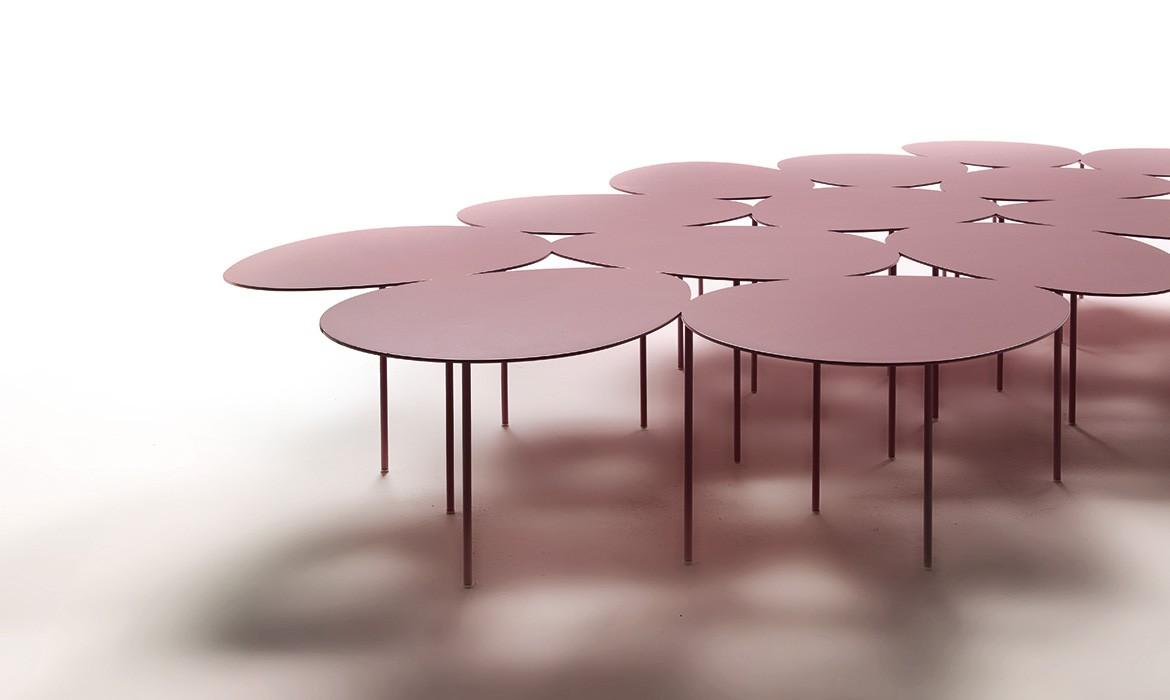 Eggs is a metal coffee table of great scenic effect. This elegant coffee table features shaped metal top and removable legs. Shop online for metal coffee tables.