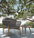 Luxurious outdoor lounge set in aluminium and teak signed by Cristian Visentin. Garden sofa, armchairs and coffee table. Shop online, free shipping.