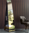 Modern and original mirror with bookcase inside. Curved bronzed glass and bronzed metal shelves. Self-supporting and pyramidal. Free home delivery.