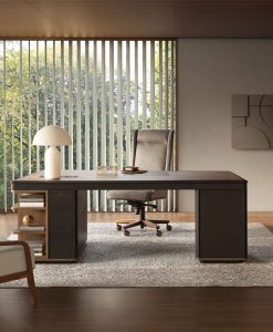 Asymmetrical top, flamed Canaletto walnut and leather, several refined wooden details. An outstanding high-end private executive desk for demanding people.