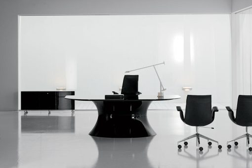 Ola, a modern black executive desk designed by Mario Mazzer, features tempered glass top and a black glossy Cristalplant base. Shop online for black glass office desks.