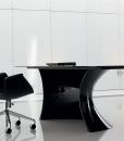 Ola, a modern black executive desk designed by Mario Mazzer, features tempered glass top and a black glossy Cristalplant base. Shop online for black glass office desks.