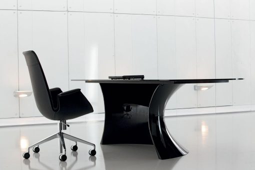Ola, a modern black executive desk designed by Mario Mazzer, features tempered glass top and a black glossy Cristalplant base. Shop online for black glass office desks.