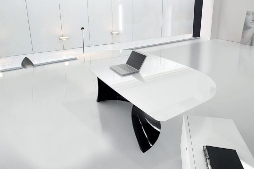 Ola Black and White is a glass office desk that not only has an exceptional look but also brings elegance and style to your office. Shop for white glass desks.