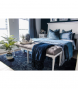 Le tapis moderne Laguna au style vintage, est de couleur bleue et forme rectangulaire. Livraison à domicile gratuite.