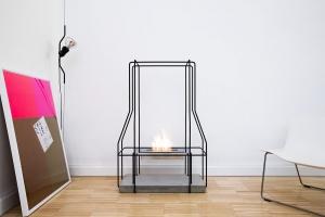 Wall Street Journal bio ethanol fireplace Giulio Iacchetti handcrafted made in Italy steel concrete cement white Carrara marble